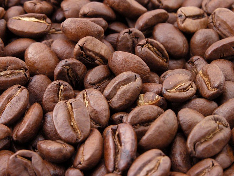 Bringing a cup of hot coffee to the mouth Bringing a cup of hot coffee to the mouth
